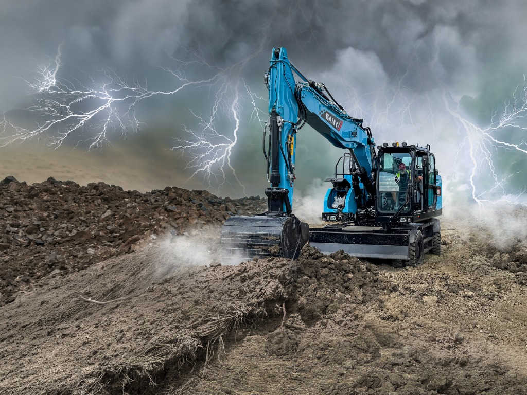 SANY SY175EW elektrisk hjulgrävare i dramatisk miljö med blixtar